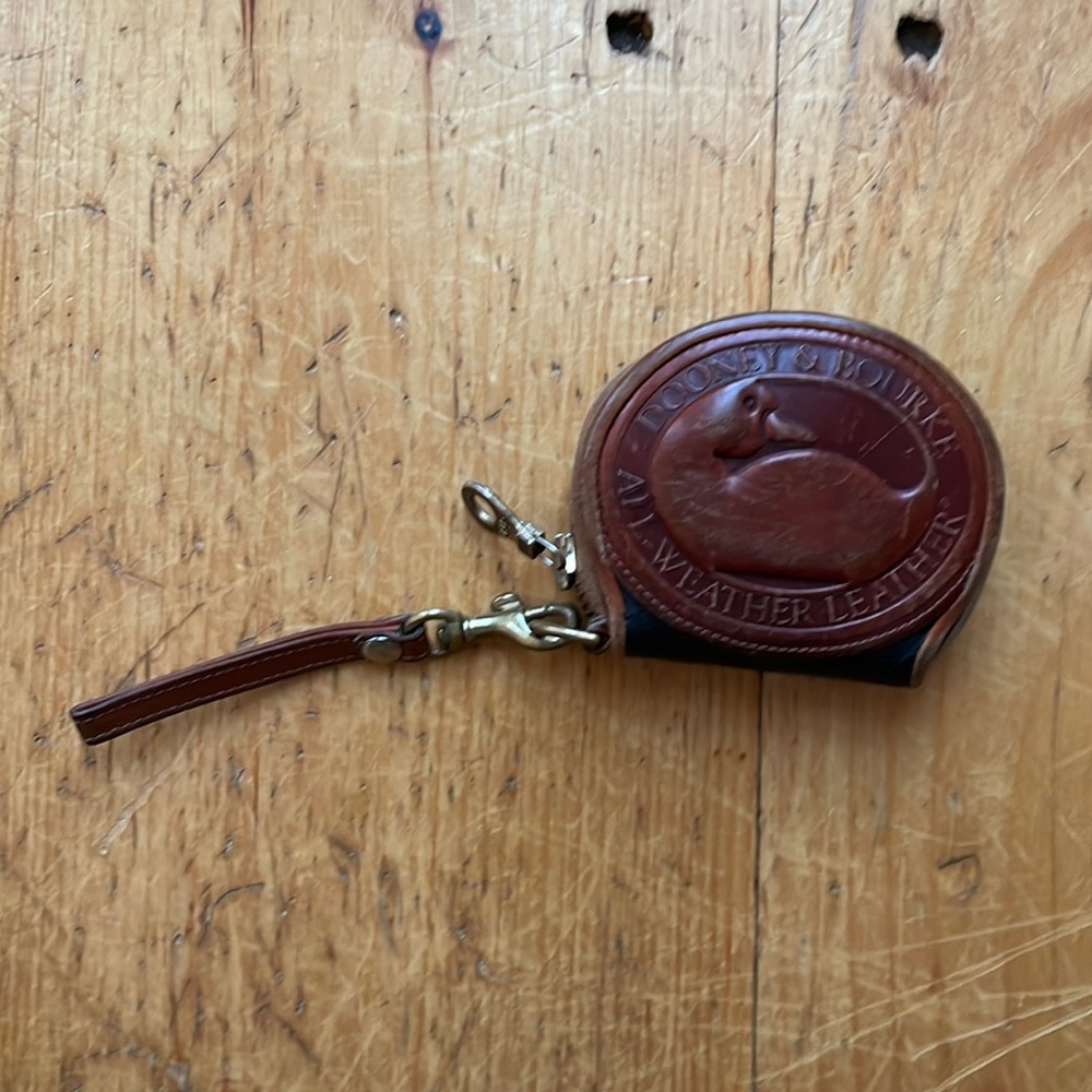 Dooney & Burke all weather leather wristlet, coin purse. Excellent condition